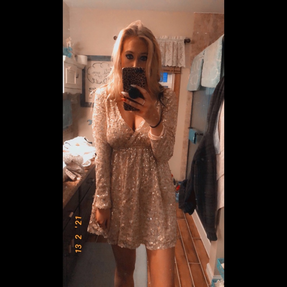 Gold sequin dress.